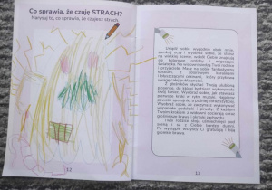 Rysunek wykonany przez dziecko w książeczce