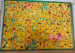 zdjęcie pokazuje gotowe puzzle naszej grupy